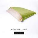 A luxury Dog Snuggle Bed, a cave bed style dog bed or sleeping bag dog bed, in upholstery-quality lime green Velour with a cream plush lining on a white backdrop.