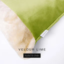 Close up of the corner of a luxury Dog Snuggle Bed, a cave bed style dog bed or sleeping bag style dog bed, with a lime green upholstery-quality velour / velvet outer cover and plush cream faux-fur lining, showing a Charley Chau designer brand label on the dog bed, on a white background.