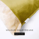 Close up of the corner of a luxury Dog Snuggle Bed, a cave bed style dog bed or sleeping bag style dog bed, with a chartreuse upholstery-quality velour / velvet outer cover and plush cream faux-fur lining, showing a Charley Chau designer brand label on the dog bed, on a white background.
