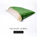 A luxury Dog Snuggle Bed, a cave bed style dog bed or sleeping bag dog bed, in upholstery-quality emerald green Velour with a cream plush lining on a white backdrop.