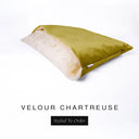 A luxury Dog Snuggle Bed, a cave bed style dog bed or sleeping bag dog bed, in upholstery-quality chartreuse Velour with a cream plush lining on a white backdrop.