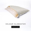 A luxury Dog Snuggle Bed, a cave bed style dog bed or sleeping bag dog bed, in upholstery-quality pale beige Velour with a cream plush lining on a white backdrop.