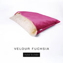 A luxury Dog Snuggle Bed, a cave bed style dog bed or sleeping bag dog bed, in upholstery-quality bright fuchsia pink Velour with a cream plush lining on a white backdrop.