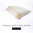A luxury Dog Snuggle Bed, a cave bed style dog bed or sleeping bag dog bed, in upholstery-quality pale stone grey Velour with a cream plush lining on a white backdrop.