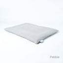 Luxury dog travel pad mattress inpale grey on a white backdrop. 