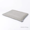 Luxury Dog Travel Pad Mattress, a slim dog bed mattress that is easy to transport, in a durable grey woven upholstery fabric on a white backdrop.