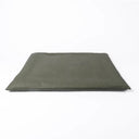 Front view of a tough, water-resistant travel dog bed and dog crate mattress in olive green Dry Wax Cotton Canvas.