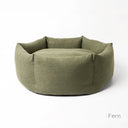 Luxury Donut Dog Bed with high sides  by designers Charley Chau in green.
