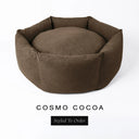 A luxury donut dog bed in warm cocoa brown Cosmo fabric, suitable for all breeds of dogs, with cosy high-wall sides and a deep-filled luxury mattress inside, on a white background with the text 'COSMO COCOA' and 'Styled To Order' below.