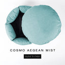 A luxury donut dog bed in pale aqua seafoam Cosmo fabric seen from above with the round mattress lifted out of the high-wall donut bed sides, on a white background with the text 'COSMO AEGEAN MIST' and a black 'Styled To Order' label.