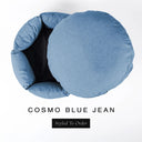A luxury donut dog bed in mid denim blue Cosmo fabric seen from above with the round mattress lifted out of the high-wall donut bed sides, on a white background with the text 'COSMO BLUE JEAN' and a black 'Styled To Order' label.