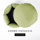 A luxury donut dog bed in soft pistachio green Cosmo fabric seen from above with the round mattress lifted out of the high-wall donut bed sides, on a white background with the text 'COSMO PISTACHIO' and a black 'Styled To Order' label.