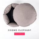 A luxury donut dog bed in dusty elephant grey Cosmo fabric seen from above with the round mattress lifted out of the high-wall donut bed sides, on a white background with the text 'COSMO ELEPHANT' and a pink 'Core Collection' label.