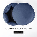 A luxury donut dog bed in dark navy blue Cosmo fabric seen from above with the round mattress lifted out of the high-wall donut bed sides, on a white background with the text 'COSMO NAVY SHADOW' and a black 'Styled To Order' label.