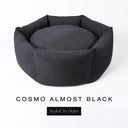 A luxury donut dog bed in charcoal black Cosmo fabric, suitable for all breeds of dogs, with cosy high-wall sides and a deep-filled luxury mattress inside, on a white background with the text 'COSMO ALMOST BLACK' and 'Styled To Order' below.