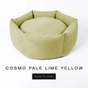 A luxury donut dog bed in pale lime yellow Cosmo fabric, suitable for all breeds of dogs, with cosy high-wall sides and a deep-filled luxury mattress inside, on a white background with the text 'COSMO PALE LIME YELLOW' and 'Styled To Order' below.