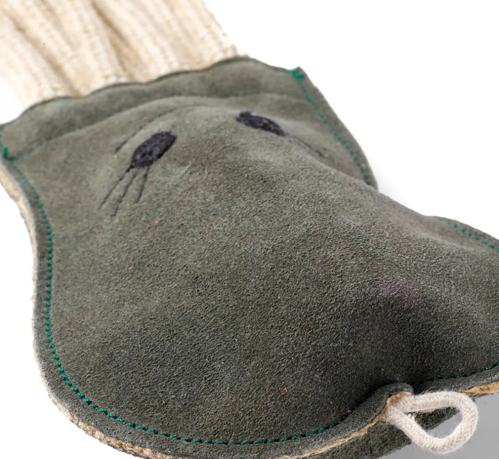 Image shows the the dog toy has a loop to be hung on pegs.