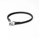 A BLACK handcrafted, fine leather house collar for dogs - a loose, leather dog collar for dog ID tags that can be worn at home to keep a tag on the dog.