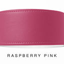 A close-up of a hand-crafted RASPBERRY PINK black leather dog collar with visible stitching, made with fine Italian Calf leather in England, labelled 'RASPBERRY PINK' below on a white background.