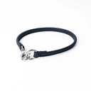 A DARK BLUE handcrafted, fine leather house collar for dogs - a loose, leather dog collar for dog ID tags that can be worn at home to keep a tag on the dog.