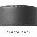 A close-up of a hand-crafted tan leather dog collar with visible stitching, made with fine Italian Calf leather in England, labelled 'SCHOOL GREY' below on a white background.