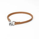 A TAN handcrafted, fine leather house collar for dogs - a loose, leather dog collar for dog ID tags that can be worn at home to keep a tag on the dog.