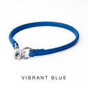 Bespoke Vibrant Blue Leather ID Tag Collar with a silver coloured clasp, also known as a House Collar on a white back drop.