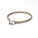 A PALE BEIGE handcrafted, fine leather house collar for dogs - a loose, leather dog collar for dog ID tags that can be worn at home to keep a tag on the dog.
