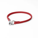 A RED handcrafted, fine leather house collar for dogs - a loose, leather dog collar for dog ID tags that can be worn at home to keep a tag on the dog.