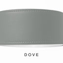 A close-up of a bespoke PALE GREY leather dog collar with visible stitching, made with fine Italian Calf leather, labelled 'DOVE' below on a white background.