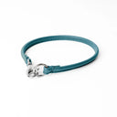 A TEAL handcrafted, fine leather house collar for dogs - a loose, leather dog collar for dog ID tags that can be worn at home to keep a tag on the dog.