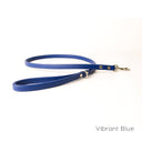 A calf leather dog lead in Vibrant Blue taken on a white backdrop. Handmade to order.