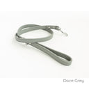 A calf leather dog lead in Dove Grey taken on a white backdrop. Handmade to order.