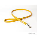 A calf leather dog lead in Daffodil taken on a white backdrop. Handmade to order.