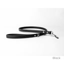 A calf leather dog lead in Black taken on a white backdrop. Handmade to order. 
