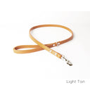 A calf leather dog lead in Light Tan taken on a white backdrop. Handmade to order.