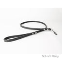 A calf leather dog lead in School Grey taken on a white backdrop. Handmade to order.