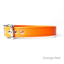 A classic style Leather Puppy Collar handmade to order for the perfect fit in calf leather shown in Orange Peel.