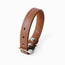 A CARAMEL BROWN handcrafted leather puppy dog collar, made to order for the perfect fit for any puppy dog.