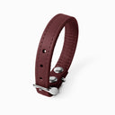 A BURGUNDY handcrafted leather puppy dog collar, made to order for the perfect fit for any puppy dog.
