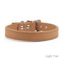 A classic style Leather Puppy Collar handmade to order for the perfect fit in calf leather shown in Light Tan.