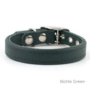 A classic style Leather Puppy Collar handmade to order for the perfect fit in calf leather shown in Bottle Green.