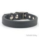 A classic style Leather Puppy Collar handmade to order for the perfect fit in calf leather shown in School Grey.