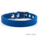 A classic style Leather Puppy Collar handmade to order for the perfect fit in calf leather shown in Vibrant Blue.