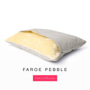 Durable and machine washable luxury dog snuggle bed in pale beige with cream faux-fur lining
