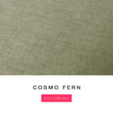 A fabric colour swatch of Cosmo, a premium upholstery-quality fabric used for Charley Chau's luxury donut dog beds, shown in muted khaki-green, with the text 'COSMO FERN' and a pink 'Core Collection' label below on a white background.