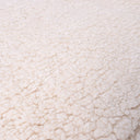 Close up of the soft, comforting Shepra Fleece Blanket on a luxurious Charley Chau dog blanket. 