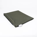 A folded spare dog bed cover for a tough, water-resistant dog bed in an olive green dry-wax cotton canvas that is highly water-resistant and is machine washable on a white background.