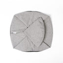 A folded Spare Dog Bed Cover set for the donut bed sides of a Charley Chau luxury Ducky Donut Dog Bed & Round Mattress in grey on a white backdrop.