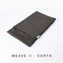 Folded Spare Bed Cover for a Charley Chau luxury dog snuggle Bed and dog burrow bag in a drk brown, textured upholstery fabric that is scrabble resistant and scratch resistant, with text "Weave II - Earth".